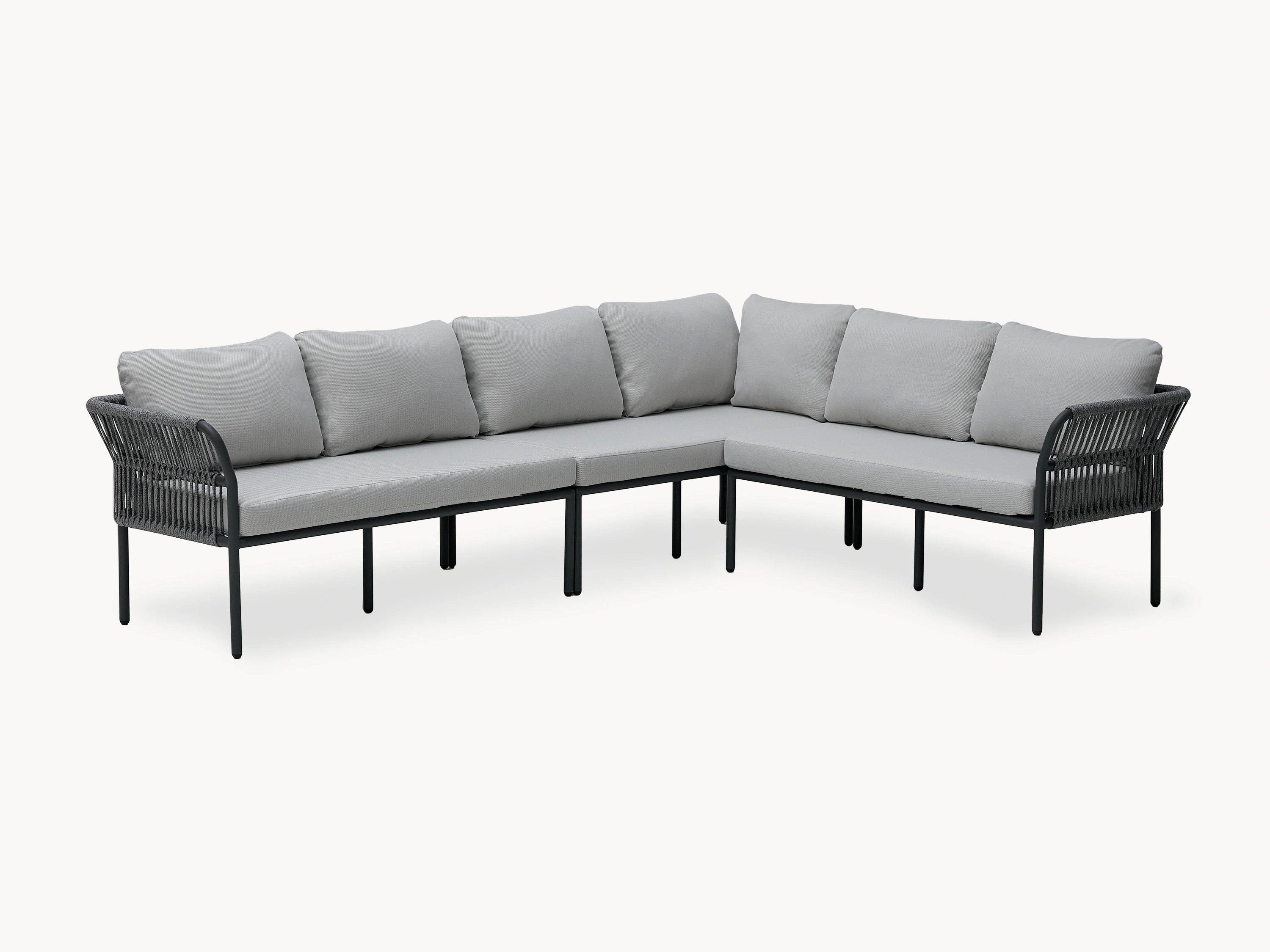 Malaga Garten Ecklounge Set (6-Sitzer) mit grauen Kissen und schwarzen Beinen, ideal für stilvolle Terrassenmöbel; wetterfeste Materialien und modulares Design bieten Flexibilität und Komfort.