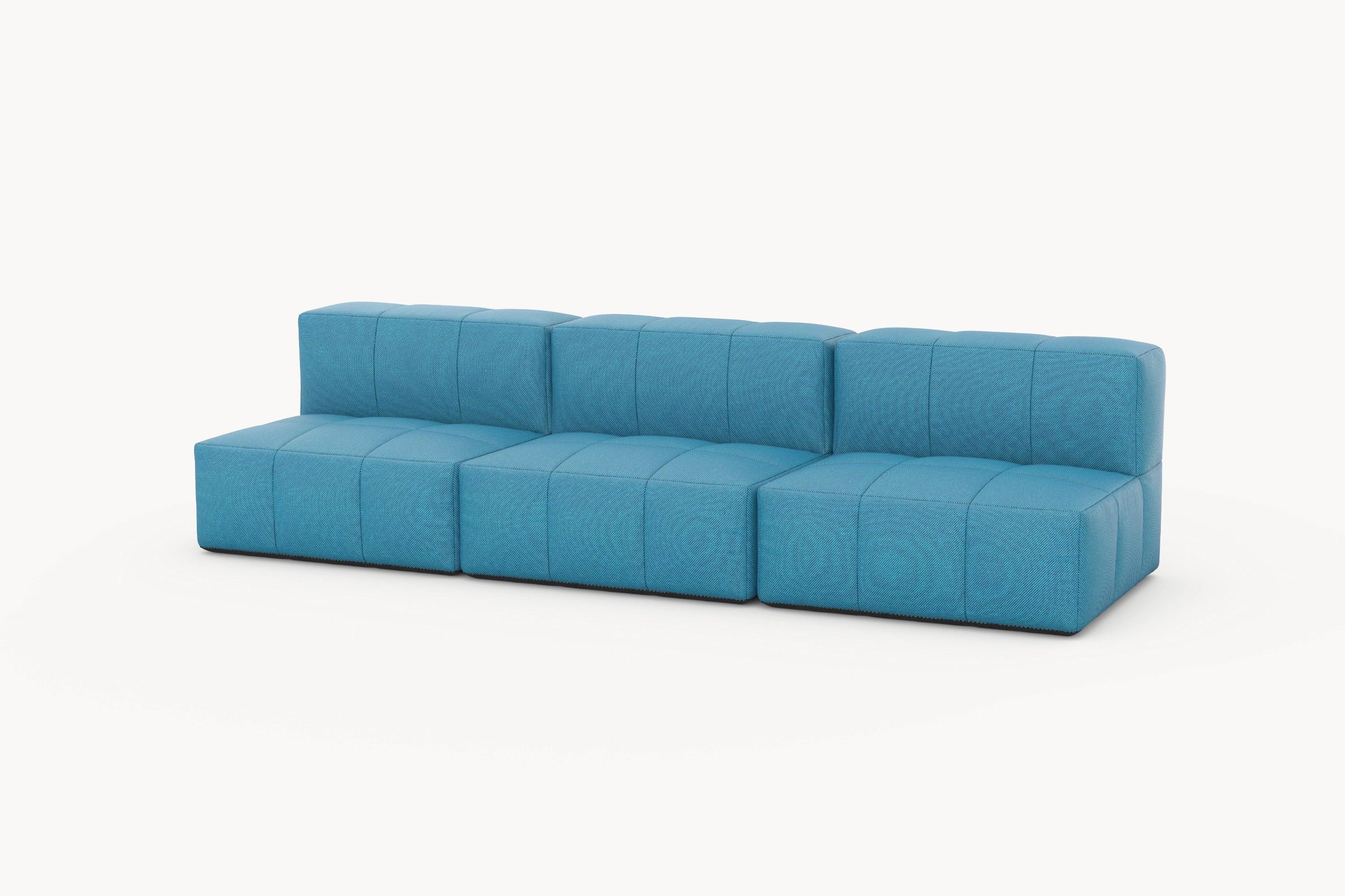 Marshmallow Modular Sofa: Ein blaues, modulares Sofa mit mehreren Kissen, inspiriert von Marshmallows. Es bietet anpassbare Gestaltungsmöglichkeiten und verbindet Komfort mit nachhaltigem Design.