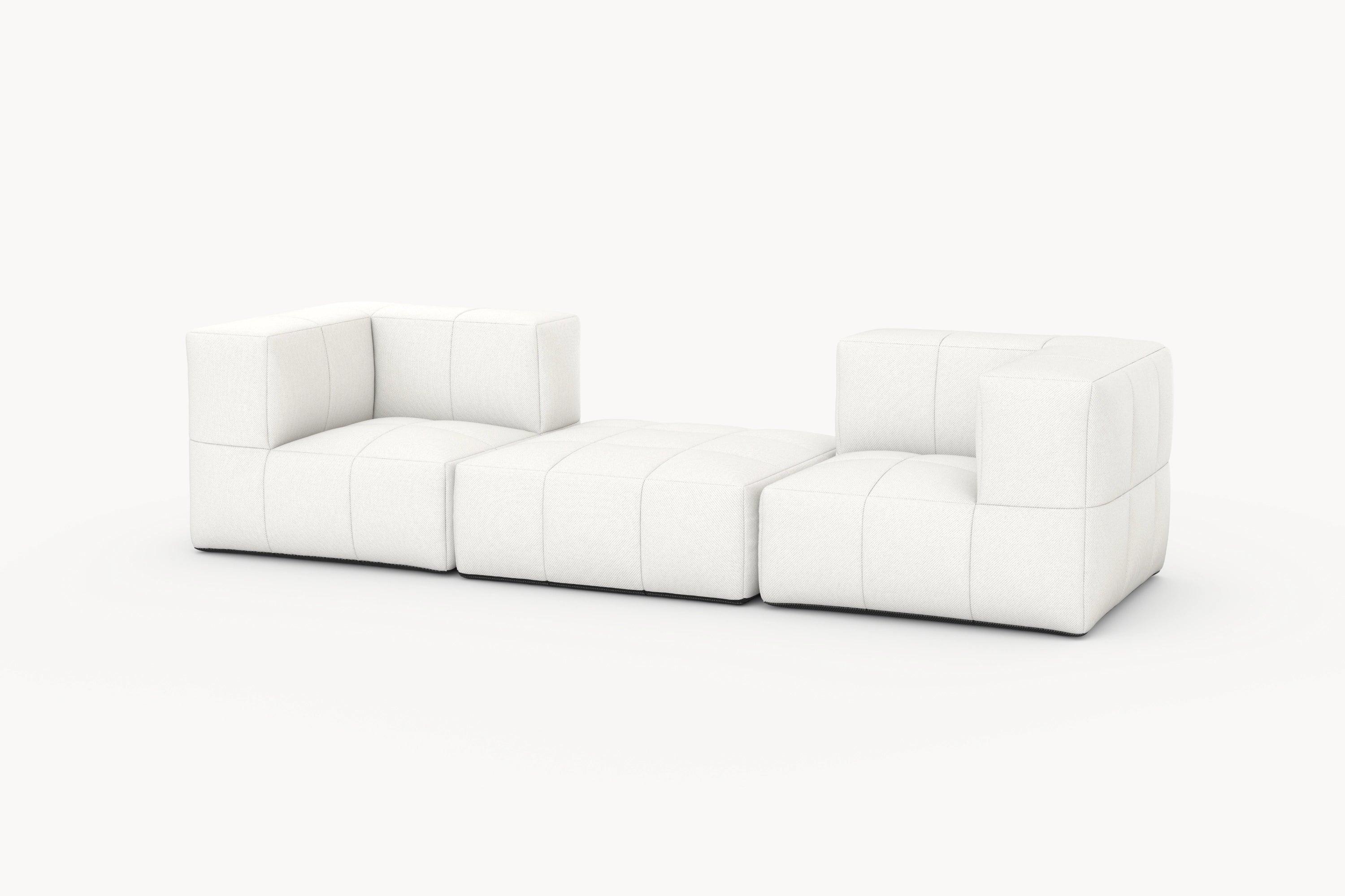 Marshmallow Modular Sofa von Finqa: Weißes, modulares Sofaset mit kubischen Elementen und schwarzen Akzenten, inspiriert von Marshmallows, bietet vielseitige Gestaltungsmöglichkeiten für komfortable, nachhaltige Lounges.
