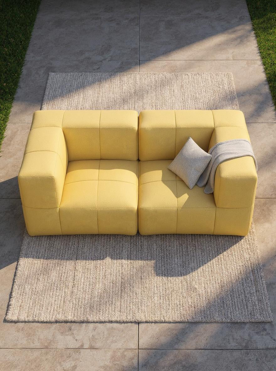 Nahaufnahme des Marshmallow Modular Sofa Set S von Finqa, inspiriert von Marshmallows. Das Sofa bietet modulare Optionen für individuelle Gestaltung und ist aus recycelten, wetterfesten Materialien gefertigt.